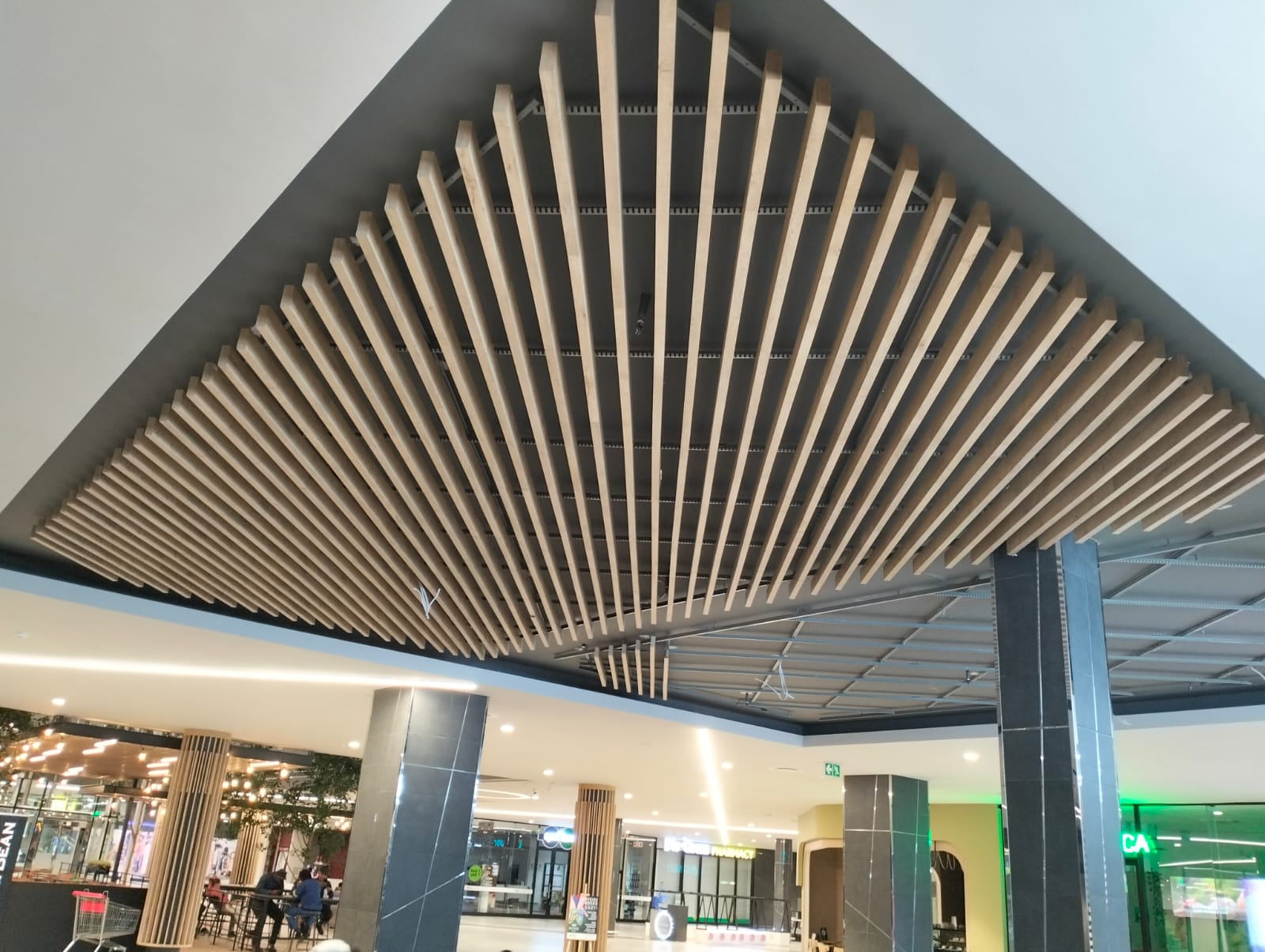 D-VELOPE interior with a suspended timber acoustic ceiling